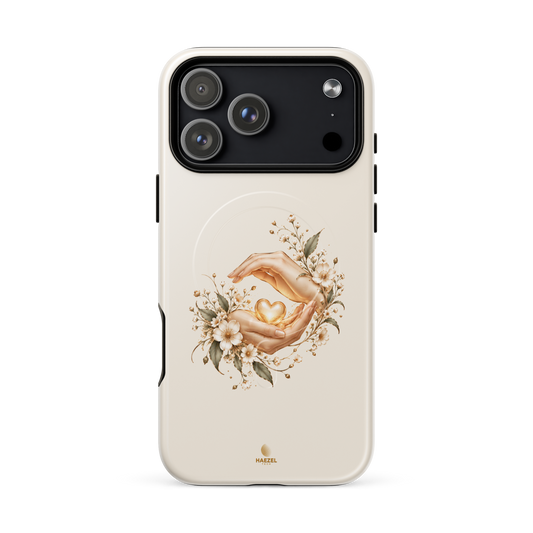 The Caregiver iPhone Case, hands cradling a golden heart with flowers on ivory. Haezel Tech Healer Series, view 18